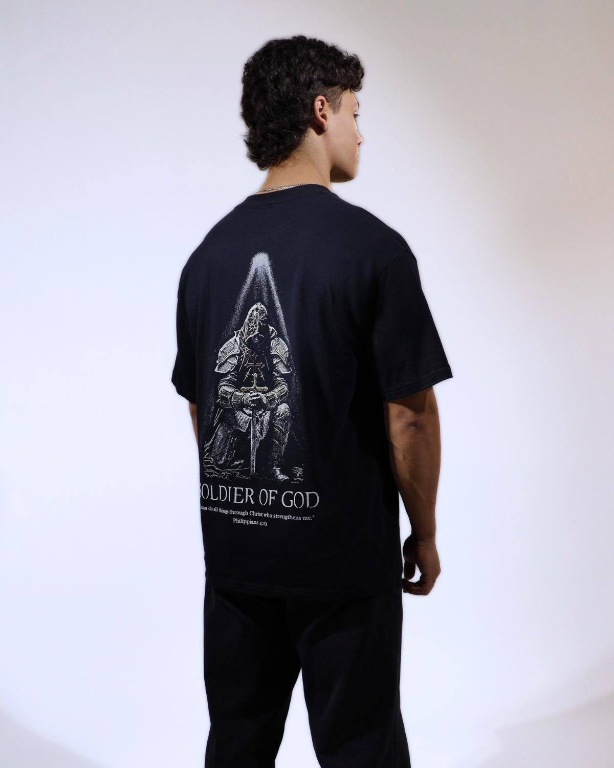 Soldier Of God faith based t-shirt black back graphic worn by model