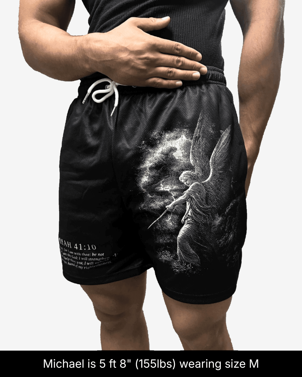 Model wearing black Fear Not shorts in size M, showing a white angel graphic.