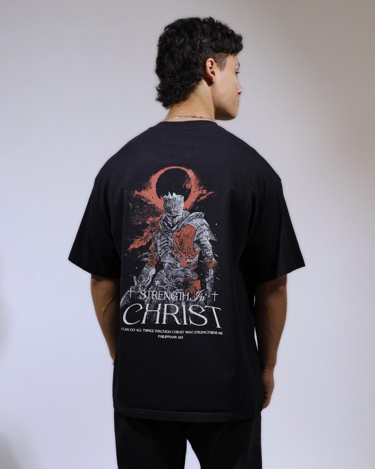 Strength In Christ faith based t-shirt black back design worn by model