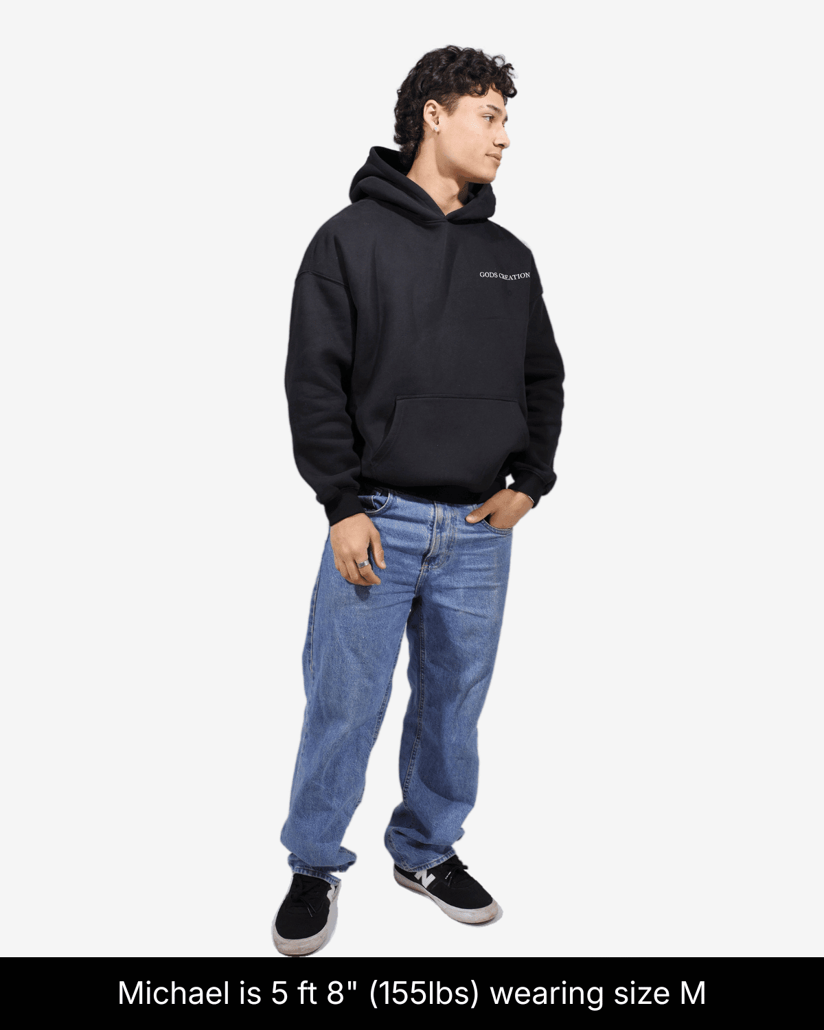 Model wearing black Soldier of God hoodie, front view in size M.